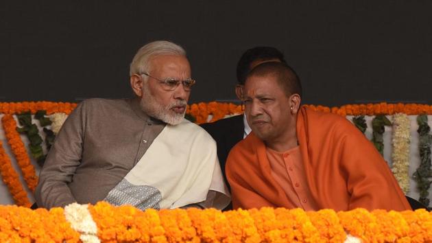 Prime minister Narendra Modi with Uttar Pradesh chief minister Adityanath Yogi at the inauguration of the Botanical Garden-Kalkaji Mandir Metro line in Noida on December 25, 2017. (Virendra Singh Gosain/HT Photo) Prime minister Narendra Modi with Uttar Pradesh chief minister Adityanath Yogi at the inauguration of the Botanical Garden-Kalkaji Mandir Metro line in Noida on December 25, 2017. (Virendra Singh Gosain/HT Photo)