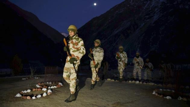 ITBP men leave for border patrol at the Nelong border outpost in Uttarkashi district. The border post is located at a height of 11,614 feet in Uttarakhand. (PTI Photo) ITBP men leave for border patrol at the Nelong border outpost in Uttarkashi district. The border post is located at a height of 11,614 feet in Uttarakhand. (PTI Photo)