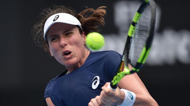 Johanna Konta of Britain hits a return against Agnieszka Radwanska of Poland in their women's singles match at the Sydney International tennis tournament on Tuesday. (AFP) Johanna Konta of Britain hits a return against Agnieszka Radwanska of Poland in their women's singles match at the Sydney International tennis tournament on Tuesday. (AFP)