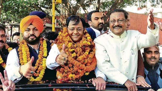 Flanked by newly elected senior deputy mayor Gurpreet Singh Dhillon (left) and BJP leader Satya Pal Jain, mayor Davesh Moudgil taking out a road show after winning the election in Chandigarh on Tuesday. (Keshav Singh/HT) Flanked by newly elected senior deputy mayor Gurpreet Singh Dhillon (left) and BJP leader Satya Pal Jain, mayor Davesh Moudgil taking out a road show after winning the election in Chandigarh on Tuesday. (Keshav Singh/HT)