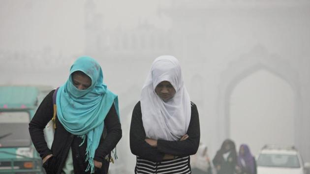 Children going to school amid heavy fog on a cold morning in Lucknow on Tuesday. (PTI) Children going to school amid heavy fog on a cold morning in Lucknow on Tuesday. (PTI)