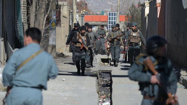 File photo taken on December 28, 2017 shows Afghan policemen keeping watch following blasts at a Shia cultural centre in Kabul in an attack claimed by the Islamic State. Middle-class Afghans turned jihadists have assisted the Islamic State's expansion from its stronghold in Afghanistan's restive east to Kabul, analysts say. (AFP) File photo taken on December 28, 2017 shows Afghan policemen keeping watch following blasts at a Shia cultural centre in Kabul in an attack claimed by the Islamic State. Middle-class Afghans turned jihadists have assisted the Islamic State's expansion from its stronghold in Afghanistan's restive east to Kabul, analysts say. (AFP)