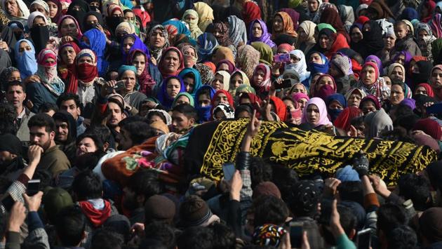 A funeral procession is taken out for eighteen-year-old militant Farhaan Wani at Wanigund in Kulgam district. The teenager had joined militant ranks in mid-2017. In November, his father Ghulam Mohammad Wani put up an emotional Facebook post urging him to relinquish violence and return home. The plea went in vain. (Tauseef Mustafa / AFP) A funeral procession is taken out for eighteen-year-old militant Farhaan Wani at Wanigund in Kulgam district. The teenager had joined militant ranks in mid-2017. In November, his father Ghulam Mohammad Wani put up an emotional Facebook post urging him to relinquish violence and return home. The plea went in vain. (Tauseef Mustafa / AFP)