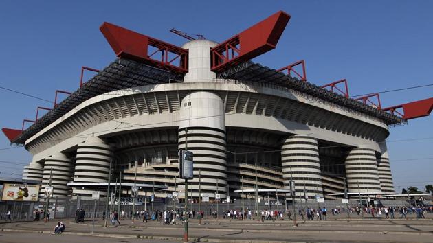A general view of the San Siro stadium – with a capacity of just over 80,000 – which is home to Serie A rivals AC Milan and Inter Milan and base of the Rossoneri since 1926.(Getty Images)