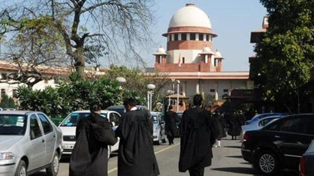 Lawyers outside Supreme Court.(Mint) Lawyers outside Supreme Court.(Mint)