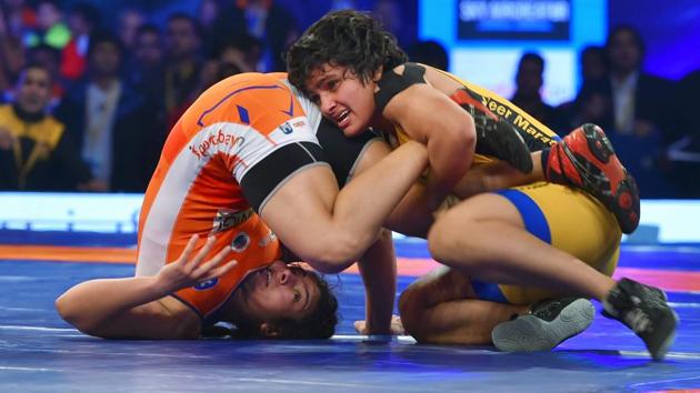 Sarita of Haryana Hammers fights against Manju Kumari of Veer Marathas (Yellow )in women's 62kg bout at Pro Wrestling League in New Delhi on Wednesday. (PTI) Sarita of Haryana Hammers fights against Manju Kumari of Veer Marathas (Yellow )in women's 62kg bout at Pro Wrestling League in New Delhi on Wednesday. (PTI)