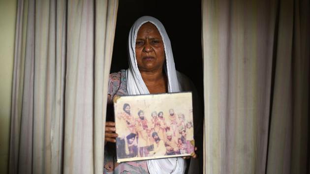 Attar Kaur who lost her husband along with other relatives during the 1984 anti-Sikh riots poses for a photo in New Delhi. The Supreme Court said on Wednesday it would constitute a fresh three-member SIT, to be headed by a former high court judge, to monitor probe into 186 anti-Sikh riot cases that followed the assassination of then prime minister Indira Gandhi, in which investigations were closed. (Sanchit Khanna / HT Photo) Attar Kaur who lost her husband along with other relatives during the 1984 anti-Sikh riots poses for a photo in New Delhi. The Supreme Court said on Wednesday it would constitute a fresh three-member SIT, to be headed by a former high court judge, to monitor probe into 186 anti-Sikh riot cases that followed the assassination of then prime minister Indira Gandhi, in which investigations were closed. (Sanchit Khanna / HT Photo)