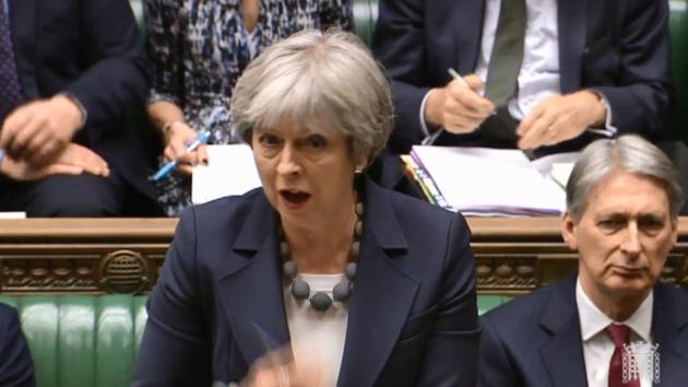 A video grab from footage broadcast by the UK Parliament's Parliamentary Recording Unit shows Britain's Prime Minister Theresa May speaking during the weekly Prime Ministers Questions session in the House of Commons in central London on Wednesday. (AFP) A video grab from footage broadcast by the UK Parliament's Parliamentary Recording Unit shows Britain's Prime Minister Theresa May speaking during the weekly Prime Ministers Questions session in the House of Commons in central London on Wednesday. (AFP)