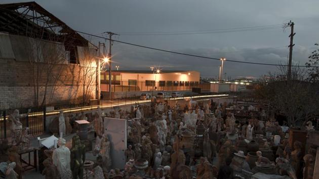 Like the 2,200-year old, life-sized sculptures of about 9,000 soldiers and imperial officials dug up in northwestern China, many of Goumas’ pieces stand in tidy ranks, in a yard fronting the long, metal-roofed shed with its old-fashioned wood-fired furnace where he works. (Petros Giannakouris / AP)