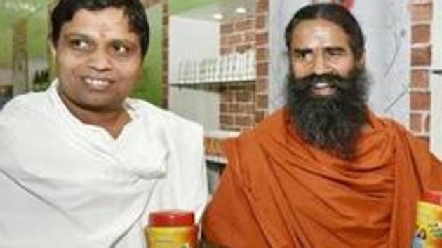Yoga guru Baba Ramdev and Patanjali Ayurveda MD Acharya Balkrishna.(HT FIle Photo)