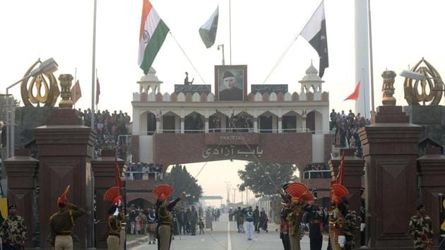 Pakistani Rangers (black uniforms) and Indian Border Security Force personnel (brown uniforms) take part in the daily beating of the retreat ceremony at the India-Pakistan Wagah Border Post, some 35km west of Amritsar, on December 24, 2017. (AFP) Pakistani Rangers (black uniforms) and Indian Border Security Force personnel (brown uniforms) take part in the daily beating of the retreat ceremony at the India-Pakistan Wagah Border Post, some 35km west of Amritsar, on December 24, 2017. (AFP)