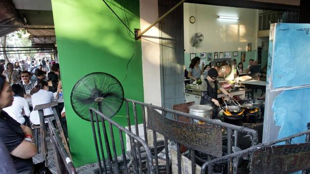 Jay Fai said she was happy about receiving the Michelin honour, but wondered why it came so late in her career. “I’ve been cooking for 30 to 40 years, so I don’t know why I’ve only just got it... I hope more Thai people will win the award next year, and they don’t just give it to Jay Fai again,” she said, expertly working her flaming woks. (Gemunu Amarasinghe / AP)