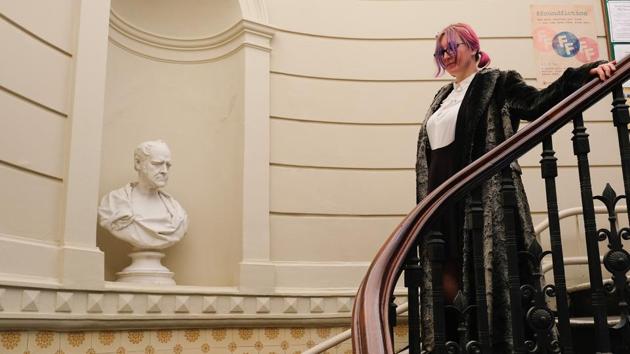 Library member Lianne-Marie Mease walks down the main staircase after a visit to the library. The library’s building is a wonderful mix of the old and the new located at the very heart of a busy shopping centre. (Ian Forsyth / Getty Images)
