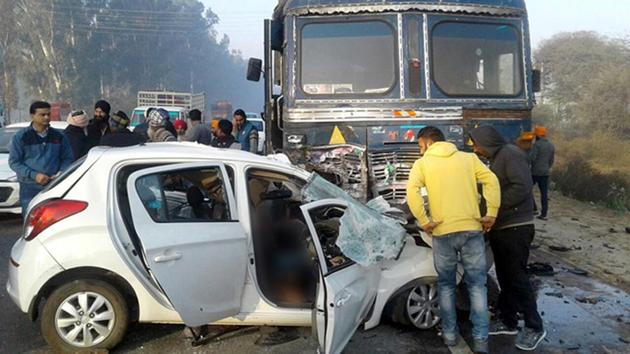 Police said the driver lost control of the car after its tyre burst. The car jumped over the divider and rammed into an oncoming truck, killing them on the spot. (HT Photo) Police said the driver lost control of the car after its tyre burst. The car jumped over the divider and rammed into an oncoming truck, killing them on the spot. (HT Photo)