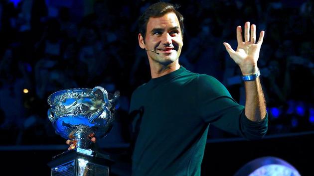 Switzerland's Roger Federer holds the men's singles trophy as he participates in the official draw ceremony ahead of the Australian Open tennis tournament. (Reuters) Switzerland's Roger Federer holds the men's singles trophy as he participates in the official draw ceremony ahead of the Australian Open tennis tournament. (Reuters)