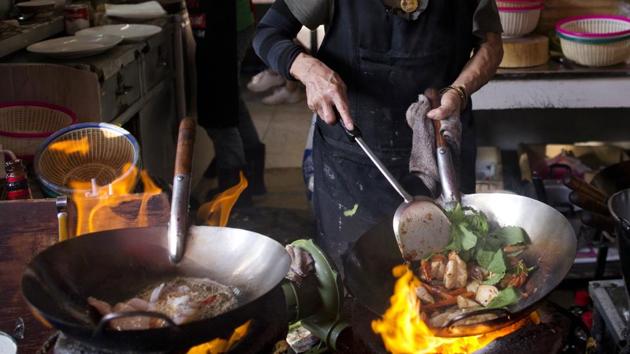 Jay Fai, as she is popularly known, is among 17 Bangkok-based chefs whose venues received coveted Michelin honours in the guidebook last month — its first foray into Thailand. Her restaurant is often featured in foreign travel guides but is mostly shunned by Thais for its high prices of what is generally considered cheap local food. (Gemunu Amarasinghe / AP)