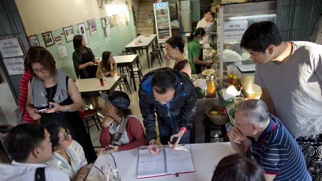 Bangkok is known for its street food, with cart-wielding vendors selling everything from Thailand’s signature noodles to spicy tom yum goong soup in stalls with metal folding tables and rickety plastic stools. Jay Fai’s was the only “street food” restaurant in the guide to receive a star. The guidebook called it “a place that both taxi drivers and foodies wax lyrical about.” (Gemunu Amarasinghe / AP)