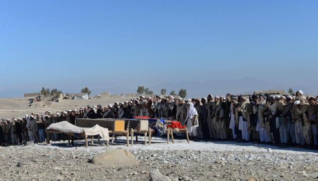 Afghan mourners offer funeral prayers for the victims of a suspected US airstrike in the Achin district of Nangarhar province on January 12, 2018. (AFP Photo) Afghan mourners offer funeral prayers for the victims of a suspected US airstrike in the Achin district of Nangarhar province on January 12, 2018. (AFP Photo)