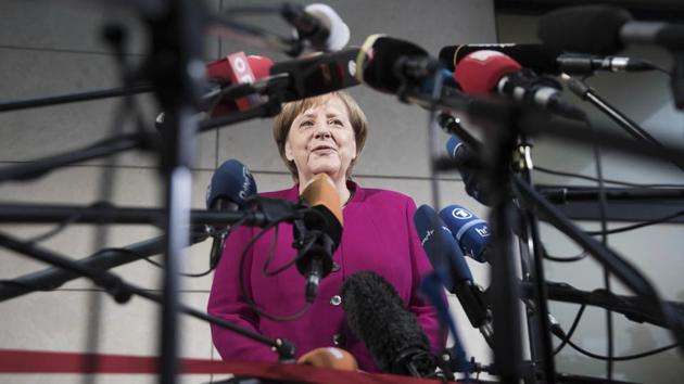 German chancellor Angela Merkel delivers a statement in Berlin on January 7, 2018. Merkel embarked Sunday on talks with the center-left Social Democrats on forming a new government, with leaders stressing the need for speed as they attempt to break an impasse more than three months after the country's election. (Joerg Carstensen / dpa via AP) German chancellor Angela Merkel delivers a statement in Berlin on January 7, 2018. Merkel embarked Sunday on talks with the center-left Social Democrats on forming a new government, with leaders stressing the need for speed as they attempt to break an impasse more than three months after the country's election. (Joerg Carstensen / dpa via AP)
