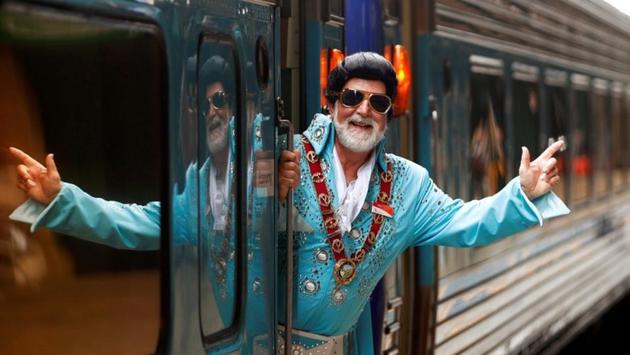 Mayor of the town of Parkes, Ken Keith, stands aboard the Elvis Express at Sydney's Central station. Street markets, lookalike contests, parades, a car show, displays of Presley artefacts and tribute performances are planned in Parkes. (Daniel Munoz / REUTERS) Mayor of the town of Parkes, Ken Keith, stands aboard the Elvis Express at Sydney's Central station. Street markets, lookalike contests, parades, a car show, displays of Presley artefacts and tribute performances are planned in Parkes. (Daniel Munoz / REUTERS)