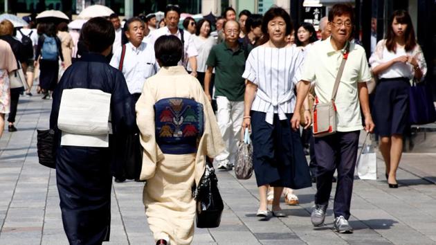 Women make their way at a shopping district in Tokyo, Japan. (Reuters File Photo) Women make their way at a shopping district in Tokyo, Japan. (Reuters File Photo)