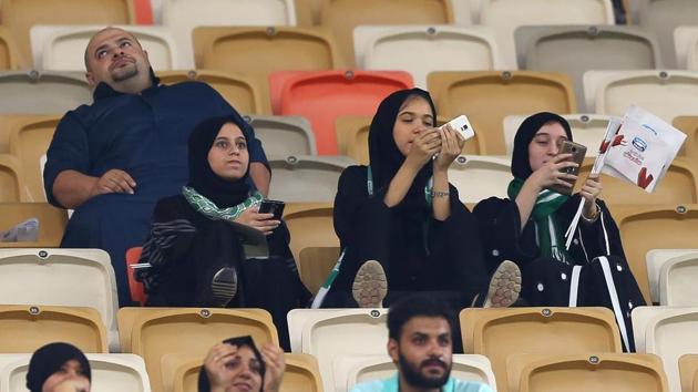Female Saudi supporters of Al-Ahli attend their teams football match against Al-Batin in the Saudi Pro League at the King Abdullah Sports City in Jeddah on January 12, 2018. (AFP Photo) Female Saudi supporters of Al-Ahli attend their teams football match against Al-Batin in the Saudi Pro League at the King Abdullah Sports City in Jeddah on January 12, 2018. (AFP Photo)