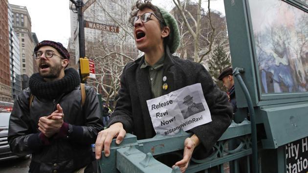 Protesters shout slogans and sing to support other protesters arrested demonstrating against the detention of prominent immigration rights activist Ravi Ragibr, in New York. (AP Photo) Protesters shout slogans and sing to support other protesters arrested demonstrating against the detention of prominent immigration rights activist Ravi Ragibr, in New York. (AP Photo)