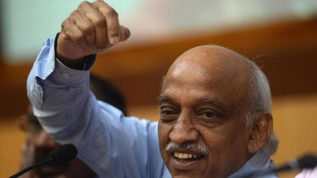 Indian Space Research Organisation (Isro) chairman Kiran Kumar Reddy gestures after the successful launch of earth observation satellite CARTOSAT-2 in Sriharikota on January 12, 2018.(AFP Photo)