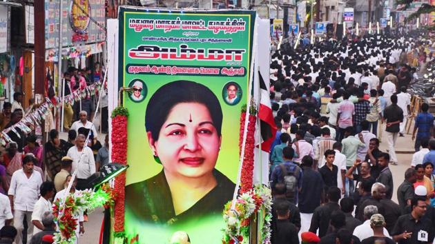AIADMK cadres stage a 'silent rally' to observe the first death anniversary of J Jayalalithaa, at West Masi Street in Madurai on Tuesday.(PTI File Photo)