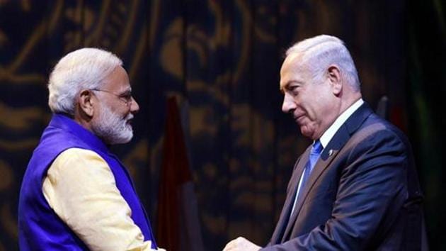 Prime Minister Narendra Modi shakes hands with Israeli Prime Minister Benjamin Netanyahu at the Community Reception Programme, in Tel Aviv, Israel. (PTI File photo) Prime Minister Narendra Modi shakes hands with Israeli Prime Minister Benjamin Netanyahu at the Community Reception Programme, in Tel Aviv, Israel. (PTI File photo)
