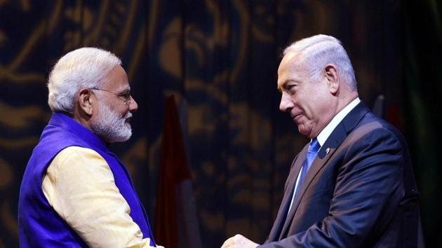 Tel Aviv: Prime Minister Narendra Modi with Israeli Prime Minister Benjamin Netanyahu, at the Community Reception Programme, Tel Aviv, Israel (File Photo)(PTI) Tel Aviv: Prime Minister Narendra Modi with Israeli Prime Minister Benjamin Netanyahu, at the Community Reception Programme, Tel Aviv, Israel (File Photo)(PTI)