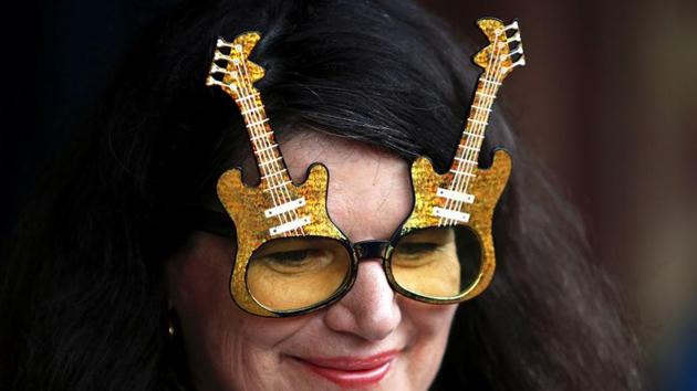 An Elvis Presley fan wears glasses shaped in the form of guitars as she prepares to board the Elvis Express train. The focus this year is on celebrating 50 years since Presley’s 1968 “comeback special,” an intimate and unplugged show credited with reviving his then-flagging recording career. (Daniel Munoz / REUTERS) An Elvis Presley fan wears glasses shaped in the form of guitars as she prepares to board the Elvis Express train. The focus this year is on celebrating 50 years since Presley’s 1968 “comeback special,” an intimate and unplugged show credited with reviving his then-flagging recording career. (Daniel Munoz / REUTERS)