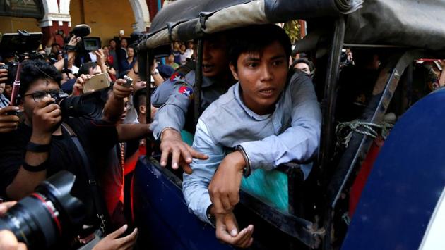 Reuters journalist Kyaw Soe Oo arrives at the court in Yangon, Myanmar on January 10, 2018. Myanmar has accused Reuters reporters Wa Lone, 31, and Kyaw Soe Oo, 27, of breaching the country’s Official Secrets Act, a little-used law from colonial rule. (REUTERS) Reuters journalist Kyaw Soe Oo arrives at the court in Yangon, Myanmar on January 10, 2018. Myanmar has accused Reuters reporters Wa Lone, 31, and Kyaw Soe Oo, 27, of breaching the country’s Official Secrets Act, a little-used law from colonial rule. (REUTERS)