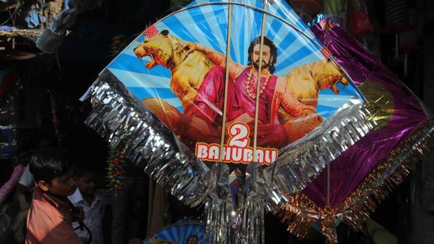 A superhero kite for fans of Bahubali was available at a kite shop in Thane market. The festival marks the end of winter, and some believe that the tradition of kite-flying is to give people a healthy exposure to the sun after the long winter months. (Praful Gangurde/HT Photo)