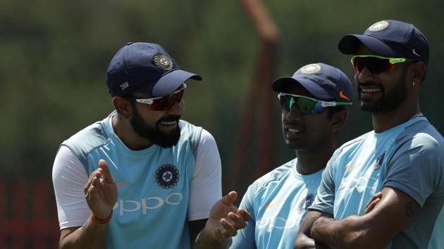 Virat Kohli shares a light moment with teammates as India face a do-or-die encounter in Centurion. (AP) Virat Kohli shares a light moment with teammates as India face a do-or-die encounter in Centurion. (AP)