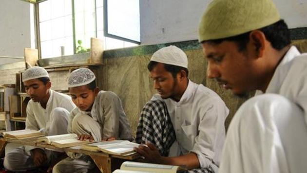 Muslims boys recite Quran at a local madrasa in Noida.(HT File Photo)