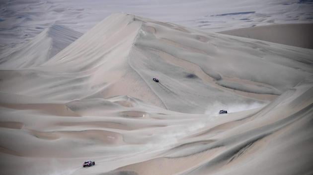 Drivers compete during the 2018 Dakar Rally Stage 2 in and around the Peruvian town of Pisco on January 7, 2018. The 40th edition of the Dakar Rally will take competitors through Peru, Bolivia and Argentina until January 20. (Frank Fife / AFP) Drivers compete during the 2018 Dakar Rally Stage 2 in and around the Peruvian town of Pisco on January 7, 2018. The 40th edition of the Dakar Rally will take competitors through Peru, Bolivia and Argentina until January 20. (Frank Fife / AFP)