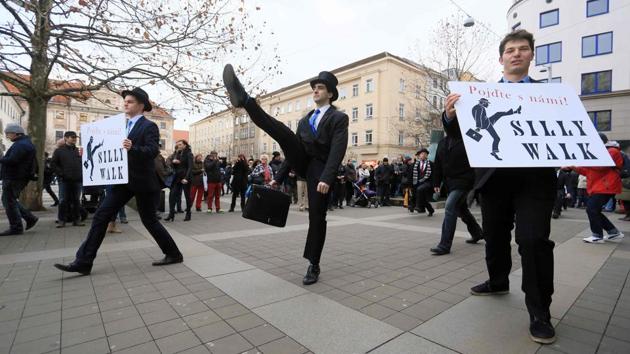 More than 300 people dressed in costumes perform the cult comedy Monty Python's Silly Walk on January 7 in Brno, Czech Republic, marking the International Silly Walk Day. (Radek Mica / AFP) More than 300 people dressed in costumes perform the cult comedy Monty Python's Silly Walk on January 7 in Brno, Czech Republic, marking the International Silly Walk Day. (Radek Mica / AFP)