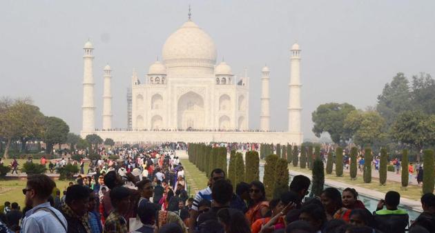 Visitors at Taj Mahal in Agra on January 9. (PTI PhotoV) Visitors at Taj Mahal in Agra on January 9. (PTI PhotoV)