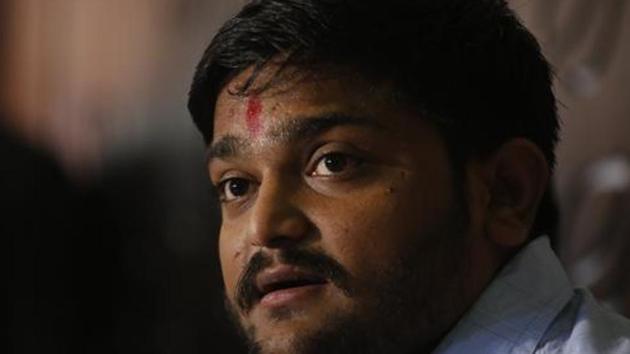 The complaint said although the permission was granted for organising an educational and farmers’ welfare event at Dhutarpar village, it turned out to be a ‘political’ programme with Hardik Patel delivering a speech. (AP File Photo) The complaint said although the permission was granted for organising an educational and farmers’ welfare event at Dhutarpar village, it turned out to be a ‘political’ programme with Hardik Patel delivering a speech. (AP File Photo)