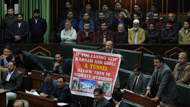 Independent MLA Sheikh Abdul Rasheed holds a poster as he protests during the J&K Legislative Assembly in Jammu, on Tuesday, January 09. (Nitin Kanotra / HT Photo) Independent MLA Sheikh Abdul Rasheed holds a poster as he protests during the J&K Legislative Assembly in Jammu, on Tuesday, January 09. (Nitin Kanotra / HT Photo)