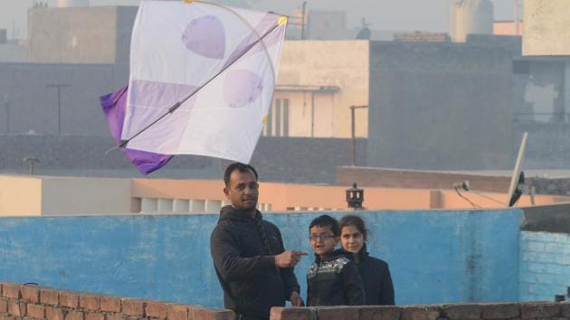 People fly kites during celebrations for the Lohri festival in Amritsar. (Narinder Nanu / AFP ) People fly kites during celebrations for the Lohri festival in Amritsar. (Narinder Nanu / AFP )