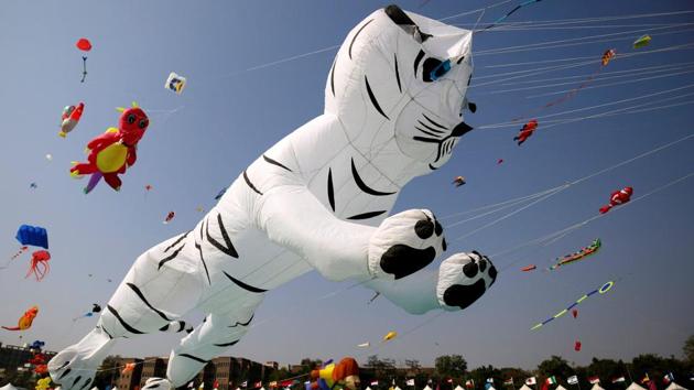 Kite-flying enthusiasts fly kites on the second day of the 8-day long International Kite Festival in Ahmedabad on January 08. (Amit Dave / REUTERS) Kite-flying enthusiasts fly kites on the second day of the 8-day long International Kite Festival in Ahmedabad on January 08. (Amit Dave / REUTERS)