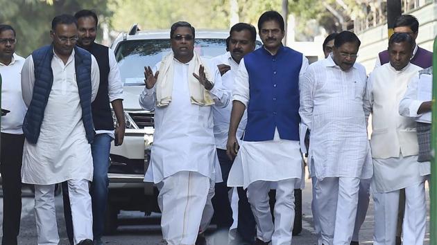 Karnataka chief minister Siddaramaiah, accompanied by a delegation of Congress leaders from the state, leaves after meeting party president Rahul Gandhi in New Delhi on Saturday.(PTI)