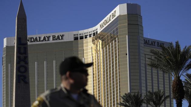 A Las Vegas police officer stands by a blocked off area near the Mandalay Bay casino in Las Vegas. (AP File Photo) A Las Vegas police officer stands by a blocked off area near the Mandalay Bay casino in Las Vegas. (AP File Photo)