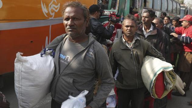 Released Indian fishermen arrive at Lahore railway station to leave for their home country, in Lahore, Pakistan on Monday. Pakistan released 147 Indian fishermen, who had been held for illegally entering and fishing in Pakistani waters. (K.M. Chaudary / AP) Released Indian fishermen arrive at Lahore railway station to leave for their home country, in Lahore, Pakistan on Monday. Pakistan released 147 Indian fishermen, who had been held for illegally entering and fishing in Pakistani waters. (K.M. Chaudary / AP)