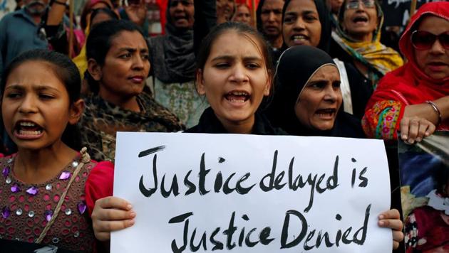 A girl holds a sign as she chants slogans with others to condemn the rape and killing of an eight-year-old in Kasur, during a protest in Karachi, on Saturday. (Reuters Photo) A girl holds a sign as she chants slogans with others to condemn the rape and killing of an eight-year-old in Kasur, during a protest in Karachi, on Saturday. (Reuters Photo)