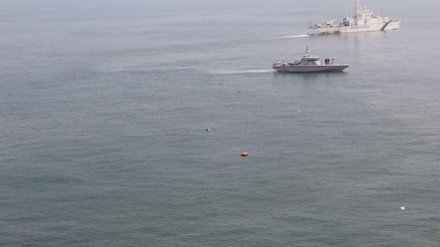 Indian navy units engaged in search and rescue after Pawan Hans helicopter crash off the coast of Mumbai , India, on Saturday, January 13, 2018.(Indian Navy Photo)