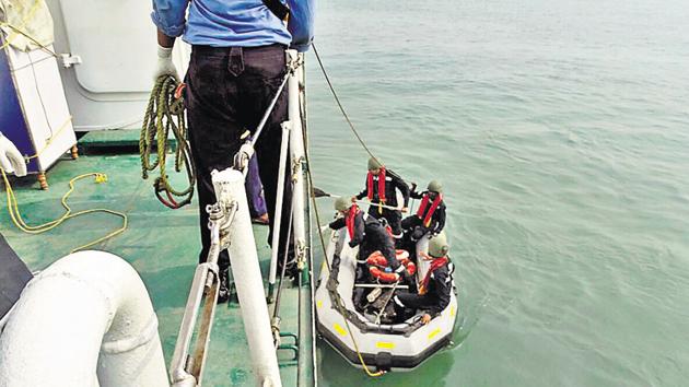 Indian Coast Guard personnel search for missing people off the coast of Mumbai.(HT Photo) Indian Coast Guard personnel search for missing people off the coast of Mumbai.(HT Photo)