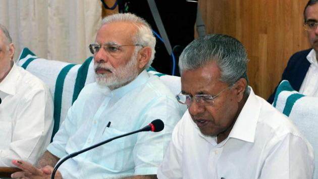 Prime Minister Narendra Modi with Kerala chief minister P Vijayan. Kerala is one of the states that have opted out of the Transforming India by 2022 scheme for not being consulted early enough.(PTI file photo)